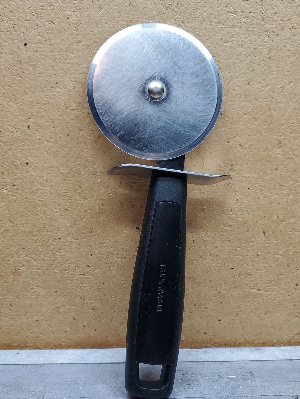 Farberware Stainless Steel Pizza Cutter with Black Handle
